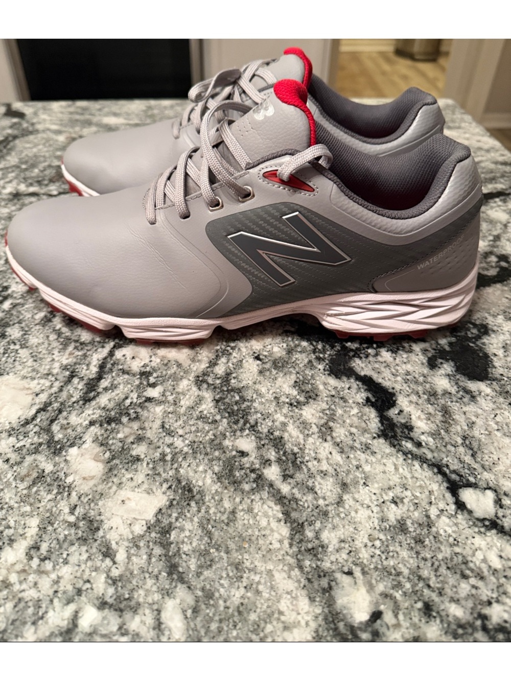 New Balance Men’s Gray Athletic Shoes with Red Accents